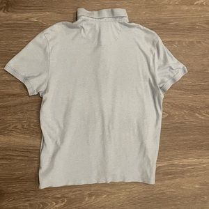 Men’s polo button down, Calvin Klein. Large, fits like medium in good condition.